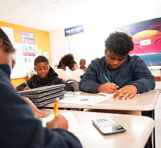 students working on classwork at desks