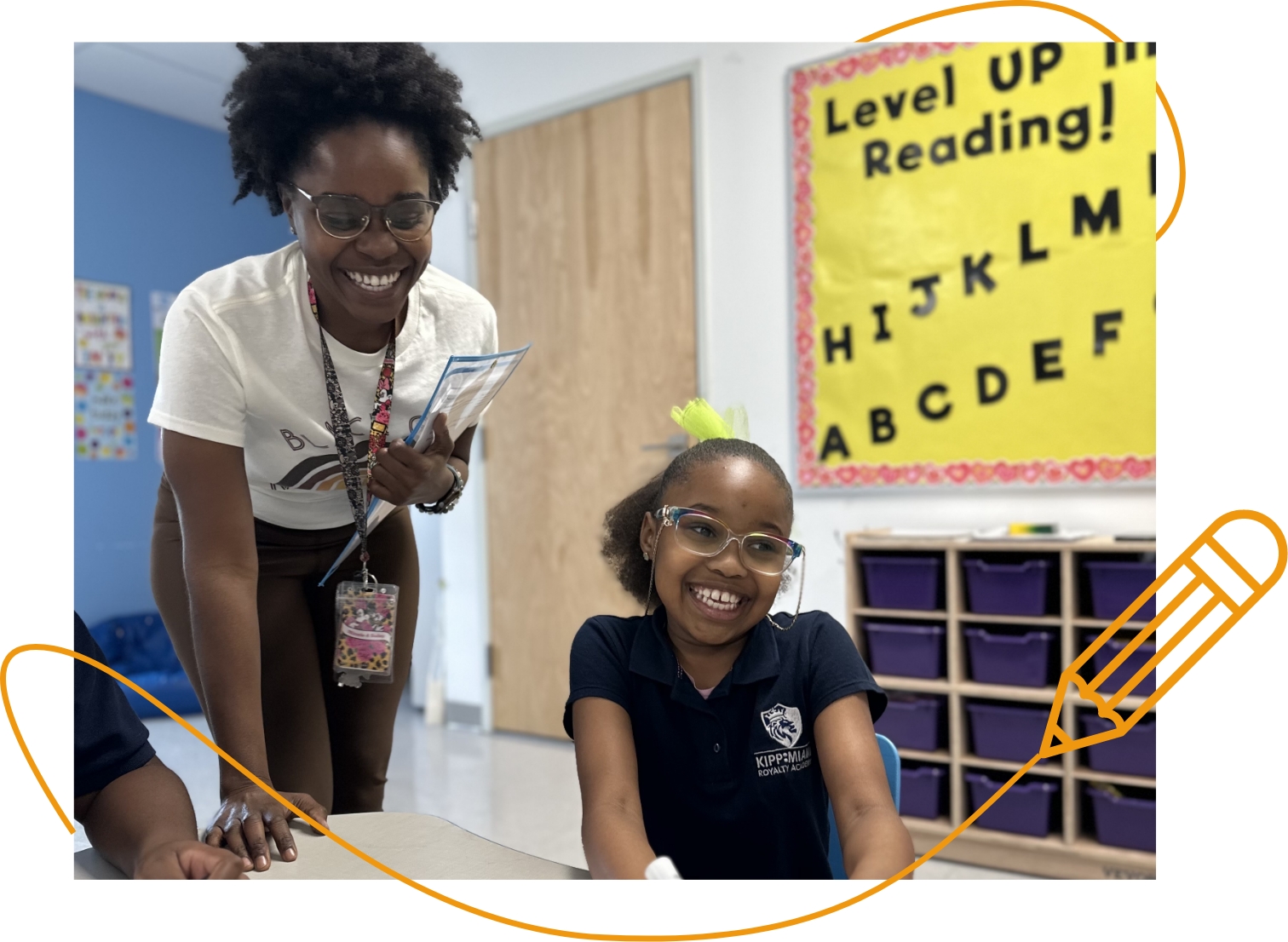 teacher and student in classroom